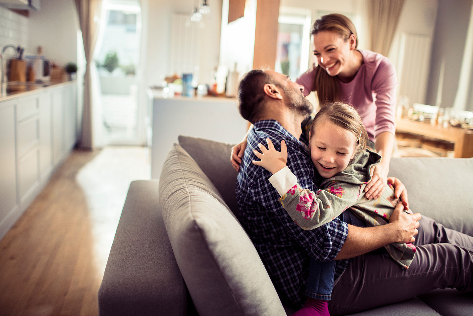 family at home comfortable with new AC installation