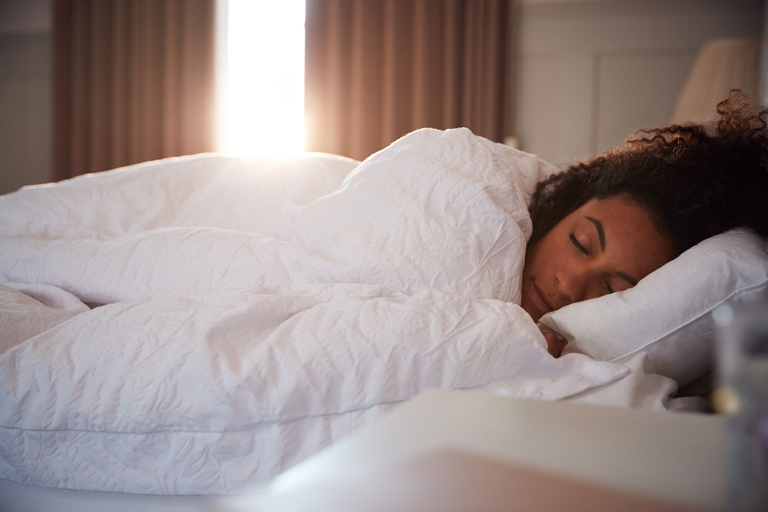 woman sleeping peacefully in bed